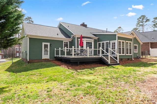 rear view of house with a deck, a fenced backyard, a yard, crawl space, and a chimney