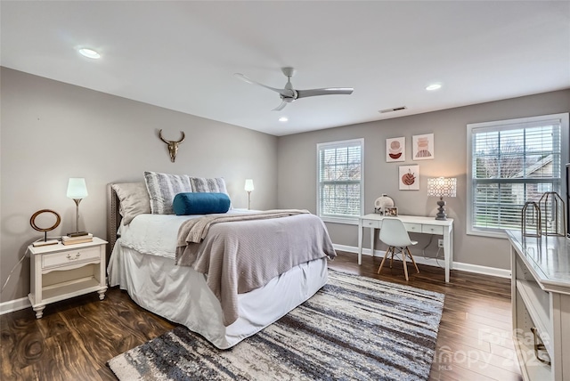 bedroom with visible vents, dark wood finished floors, recessed lighting, baseboards, and ceiling fan