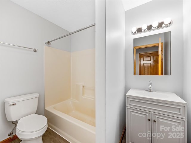 full bathroom with shower / bathing tub combination, vanity, and toilet