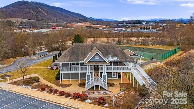 exterior space featuring a mountain view