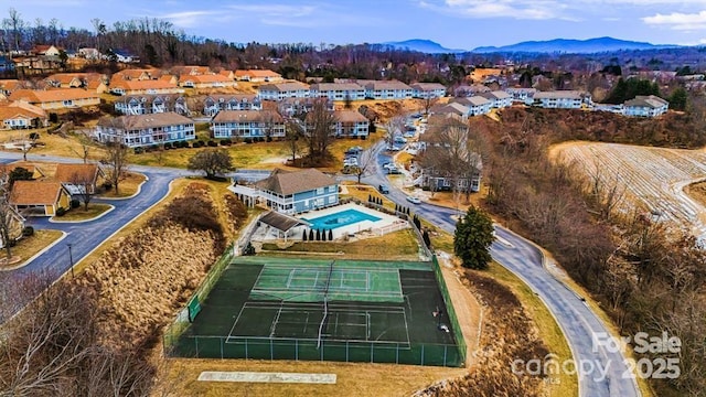 bird's eye view with a mountain view and a residential view