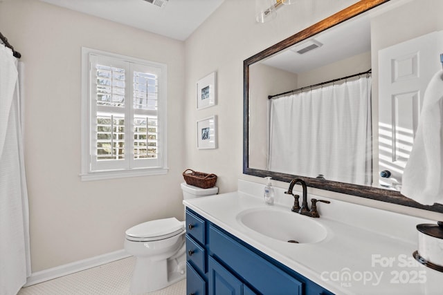 bathroom with visible vents, baseboards, toilet, tile patterned flooring, and vanity