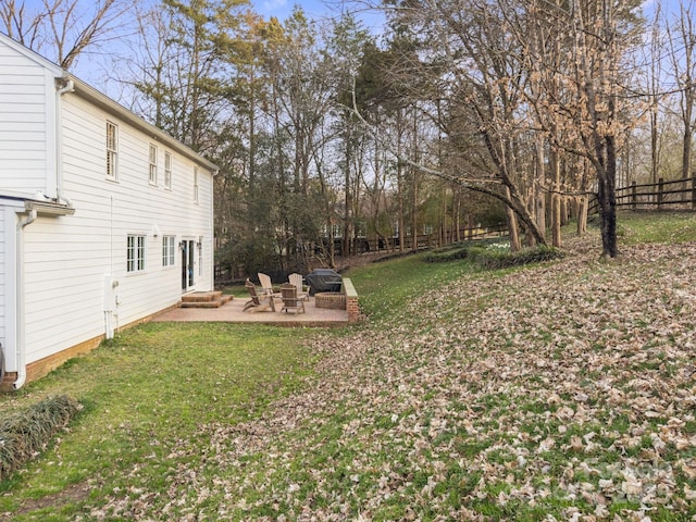 view of yard with a patio area and fence