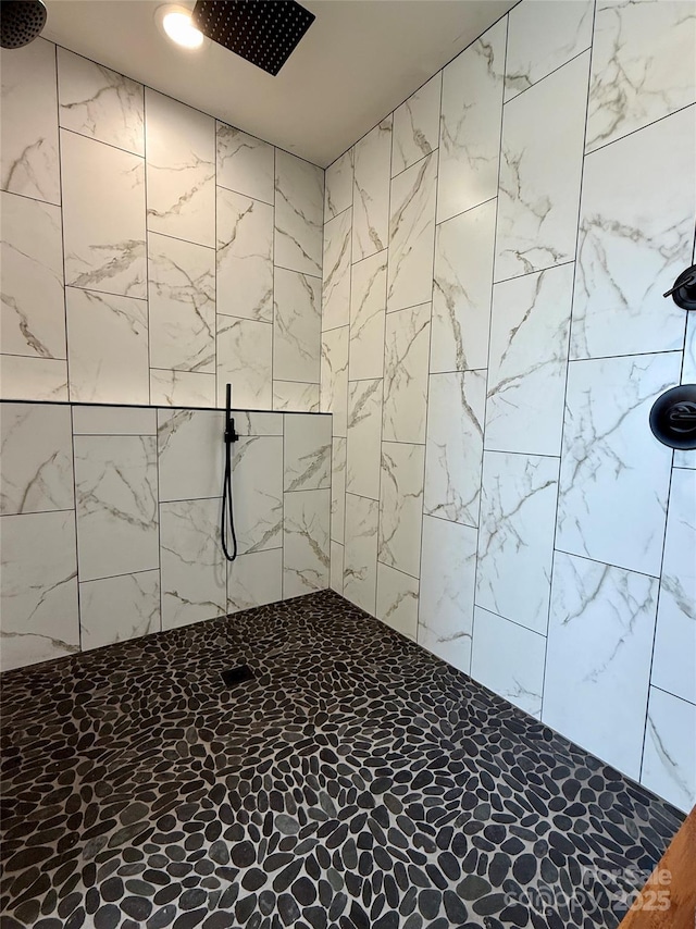 room details with a tile shower