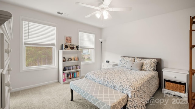 bedroom featuring carpet, visible vents, ceiling fan, and baseboards