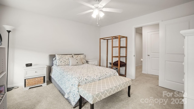 bedroom with carpet floors, ceiling fan, and baseboards