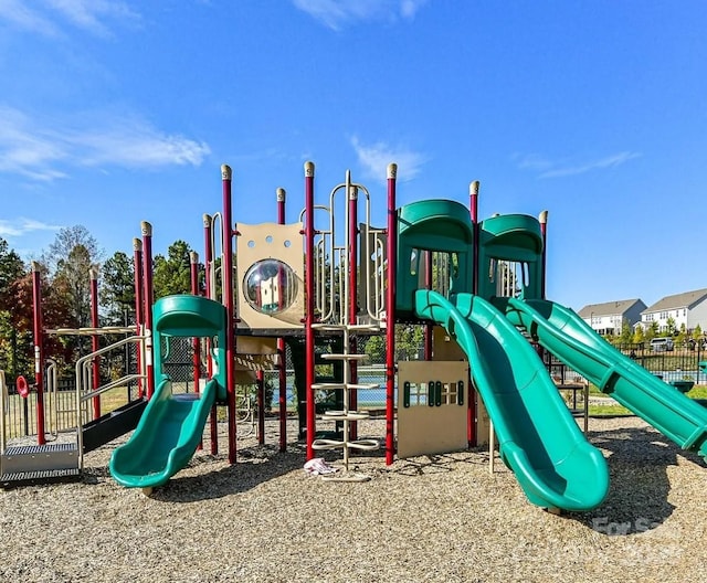 community play area featuring fence