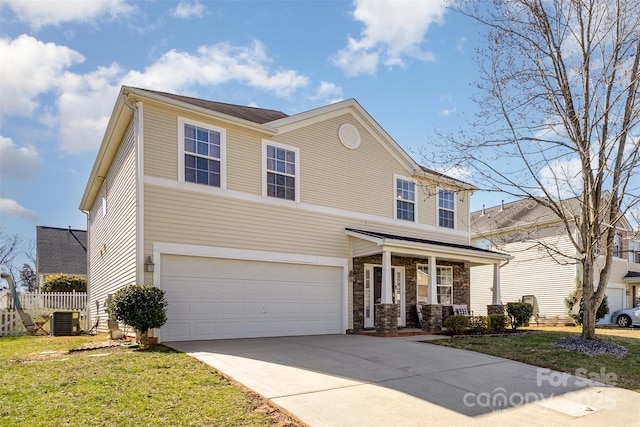 traditional home with a porch, central air condition unit, a garage, fence, and concrete driveway