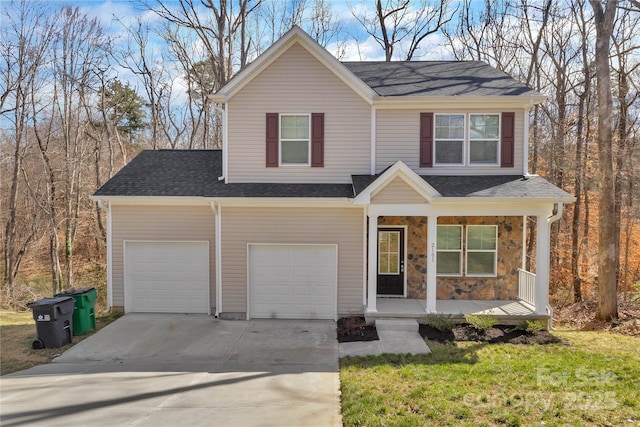 view of front of home with covered porch, stone siding, roof with shingles, and driveway