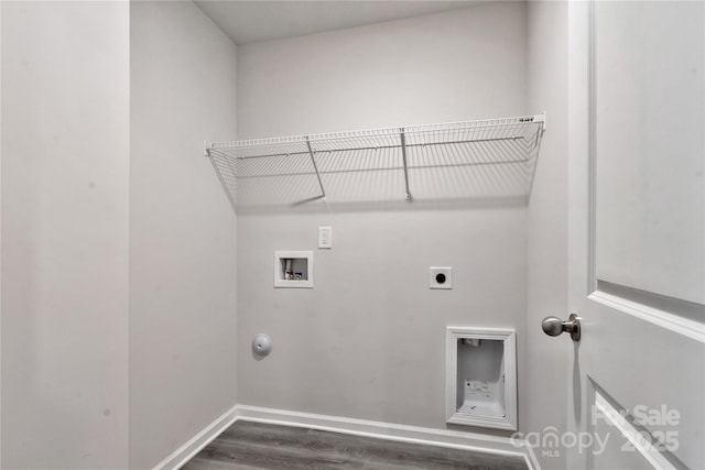 laundry room featuring hookup for a washing machine, hookup for an electric dryer, laundry area, dark wood-type flooring, and baseboards