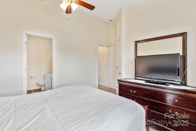 bedroom featuring ceiling fan and ensuite bathroom