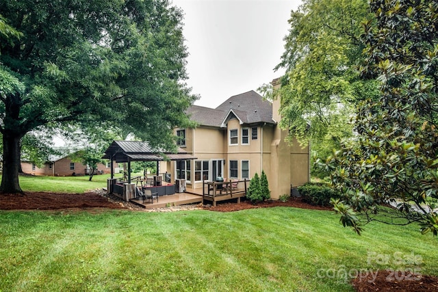 4825 1st Street Ct NW, Hickory, NC 28601 - back of property featuring a gazebo, stucco siding, a yard, a deck, and outdoor lounge area