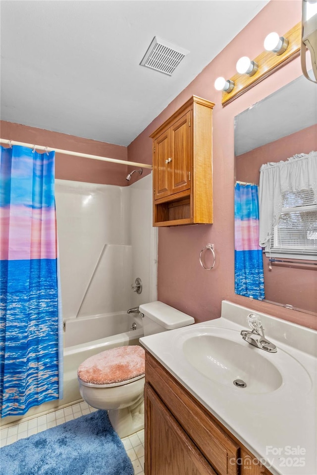 bathroom featuring vanity, visible vents, tile patterned flooring, toilet, and shower / tub combo with curtain