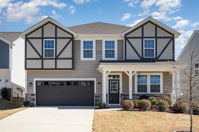 english style home with a shingled roof, stucco siding, a garage, stone siding, and driveway