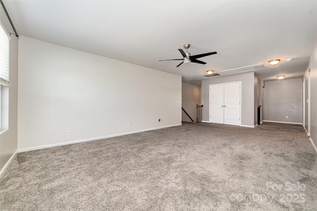 19113 Hawk Haven Ln, Charlotte, NC 28278 - unfurnished living room with attic access, carpet floors, and ceiling fan