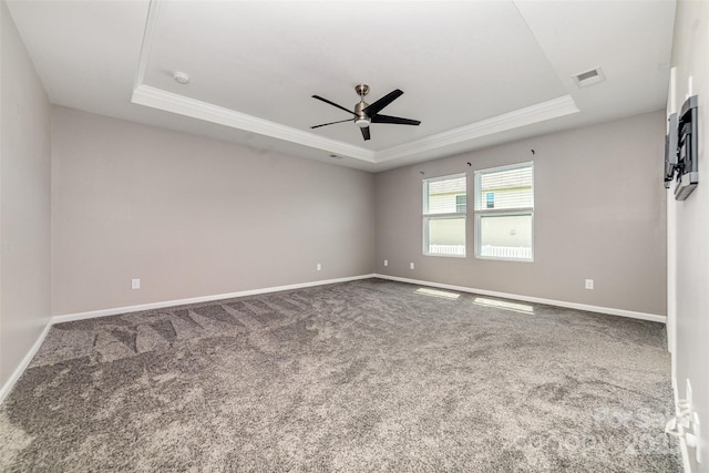 19113 Hawk Haven Ln, Charlotte, NC 28278 - carpeted spare room with a raised ceiling, ornamental molding, a ceiling fan, and a smoke detector