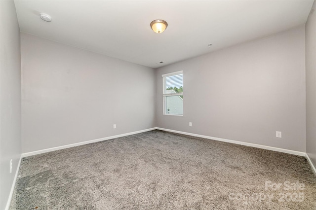 19113 Hawk Haven Ln, Charlotte, NC 28278 - unfurnished room with carpet floors, baseboards, and a smoke detector