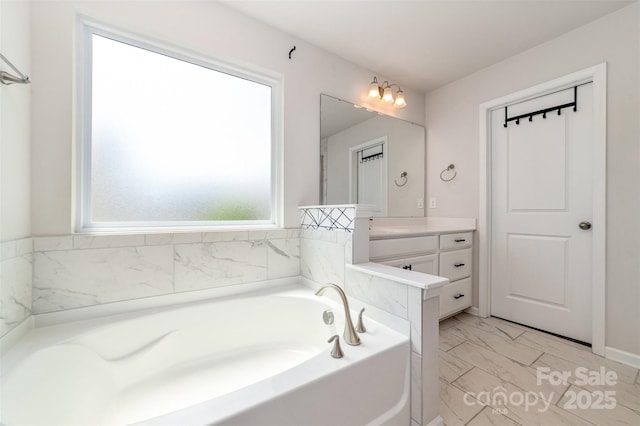 19113 Hawk Haven Ln, Charlotte, NC 28278 - full bathroom with vanity, marble finish flooring, and a garden tub