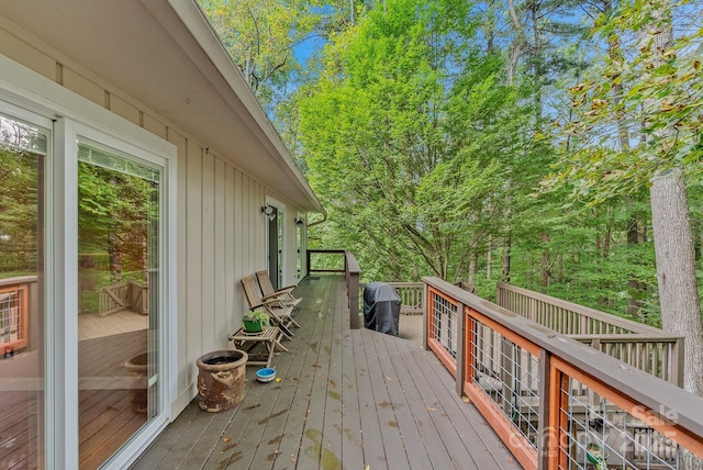 wooden terrace with grilling area