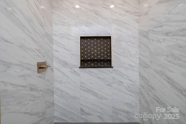 room details with a tile shower