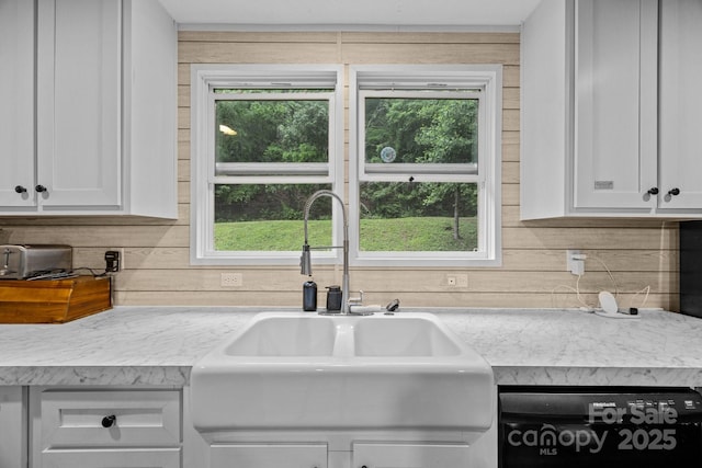 11 Pyrite Way, Asheville, NC 28806 - kitchen featuring a sink, black dishwasher, light countertops, and white cabinets