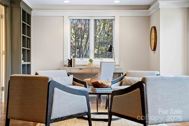 dining room with wood finished floors and recessed lighting