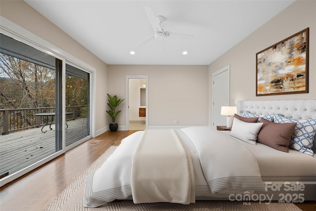 bedroom with ensuite bathroom, recessed lighting, wood finished floors, baseboards, and access to exterior