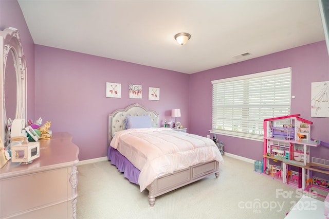 bedroom featuring light carpet, baseboards, and visible vents