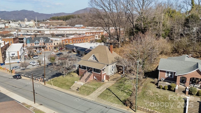 aerial view featuring a residential view and a mountain view