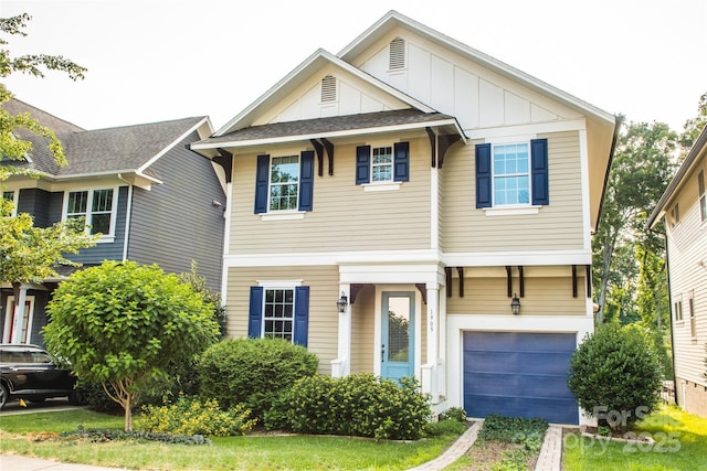 1905 Summey Ave, Charlotte, NC 28205 - view of front of home with board and batten siding and a garage