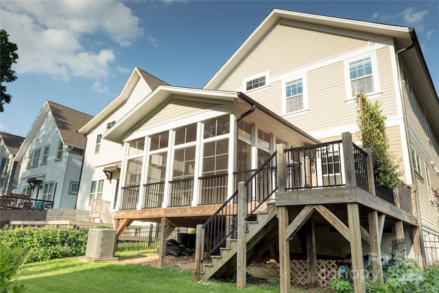 1905 Summey Ave, Charlotte, NC 28205 - back of property featuring a sunroom, stairway, a deck, and central air condition unit