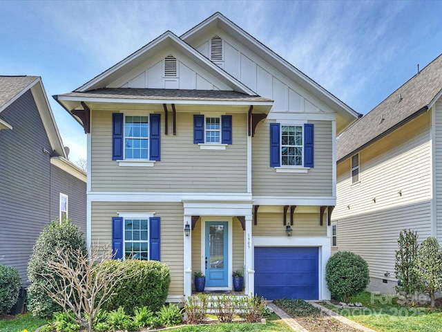 1905 Summey Ave, Charlotte, NC 28205 - view of front of house with a garage, board and batten siding, and driveway