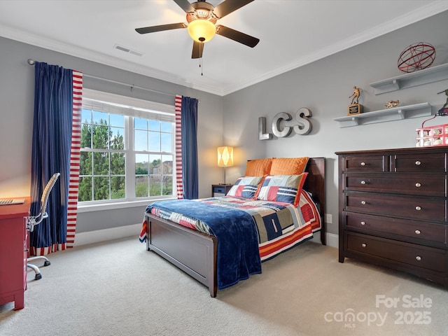 bedroom with crown molding, carpet floors, baseboards, and visible vents