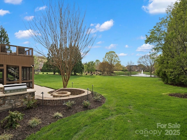 view of yard with stairs and a wooden deck