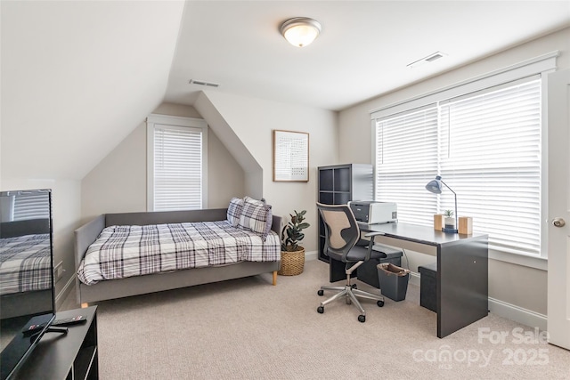 bedroom featuring lofted ceiling, carpet flooring, visible vents, and baseboards