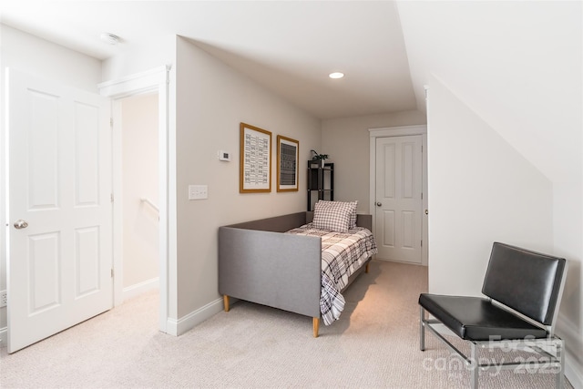 bedroom featuring baseboards, recessed lighting, and light colored carpet