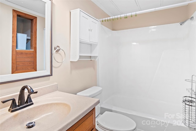 full bath with toilet,  shower combination, and vanity