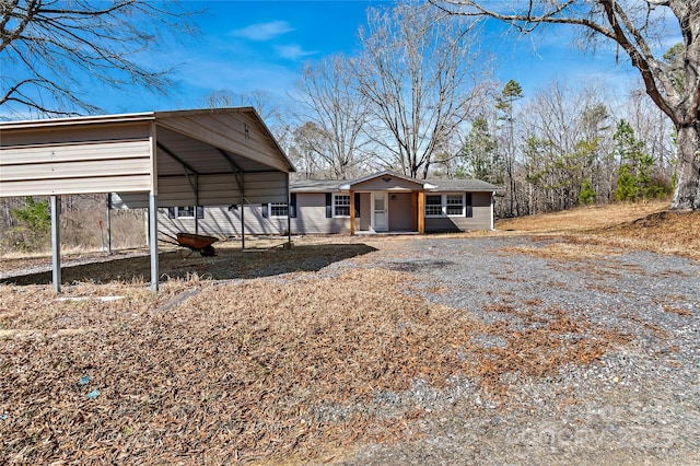 view of front facade with a detached carport