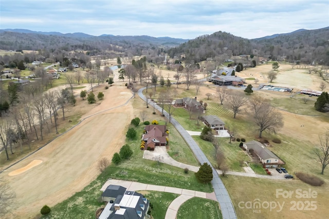 drone / aerial view with a rural view and a mountain view