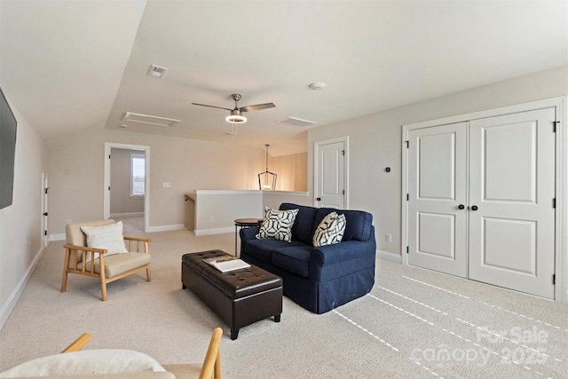 living room featuring baseboards, a ceiling fan, visible vents, and light carpet