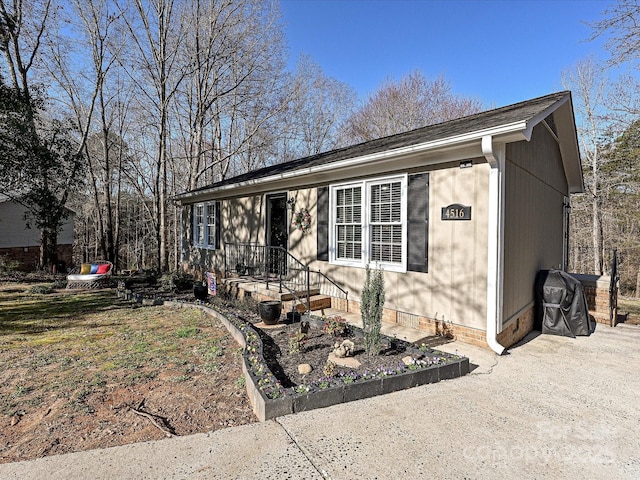 view of front of home featuring crawl space