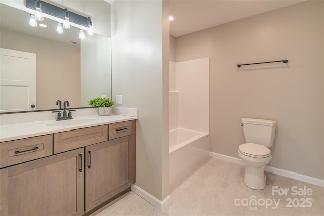 full bath featuring bathing tub / shower combination, baseboards, toilet, and vanity