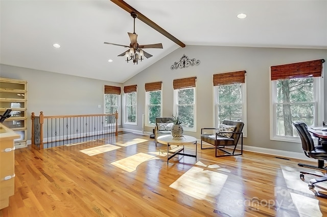 living area featuring lofted ceiling with beams, recessed lighting, a ceiling fan, baseboards, and light wood-type flooring