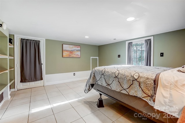 tiled bedroom with recessed lighting, visible vents, and baseboards