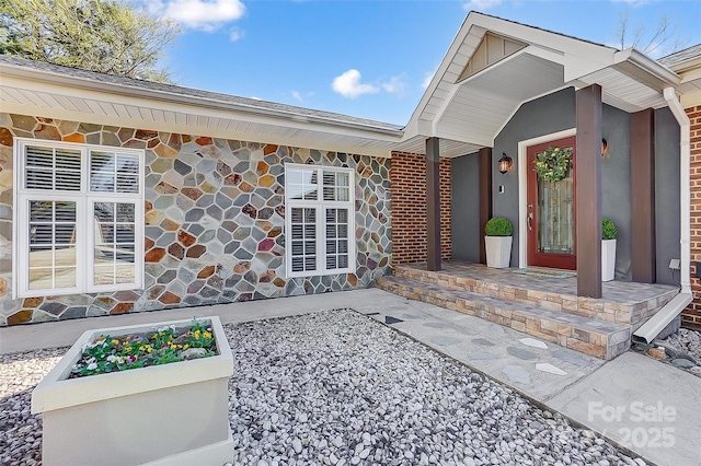 property entrance with a porch