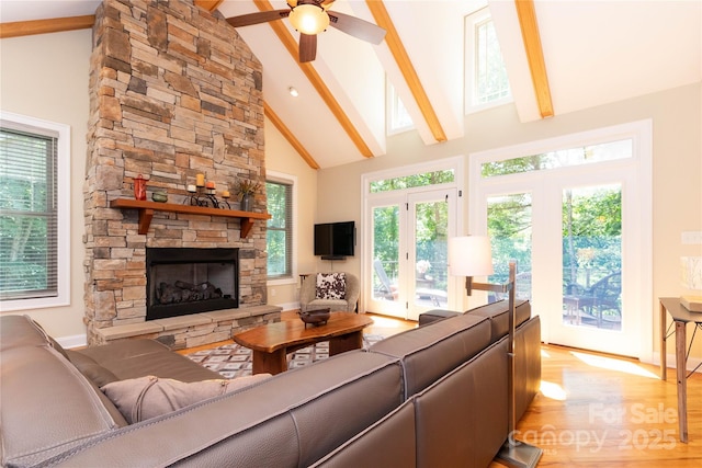 39 Hawks Pointe Ln, Weaverville, NC 28787 - living area featuring beamed ceiling, light wood-type flooring, a fireplace, high vaulted ceiling, and ceiling fan