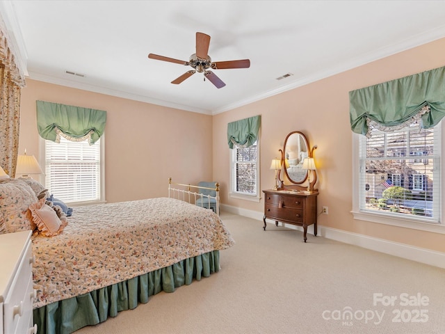 bedroom with light carpet, visible vents, and ornamental molding