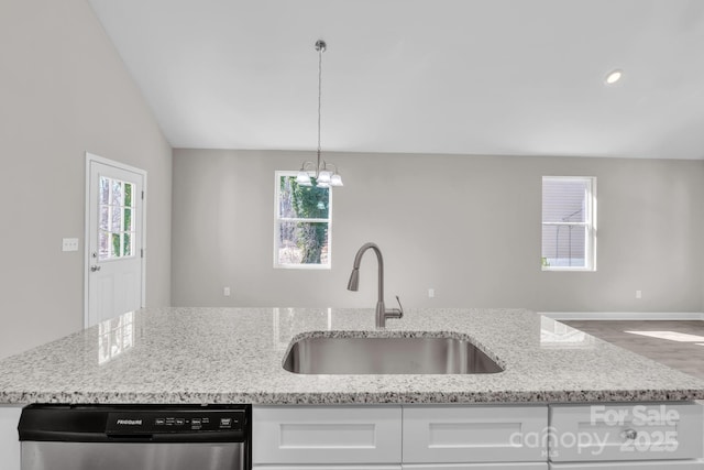 kitchen with white cabinets, a healthy amount of sunlight, a sink, and stainless steel dishwasher