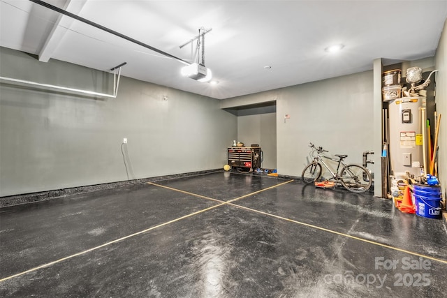 garage with water heater and a garage door opener