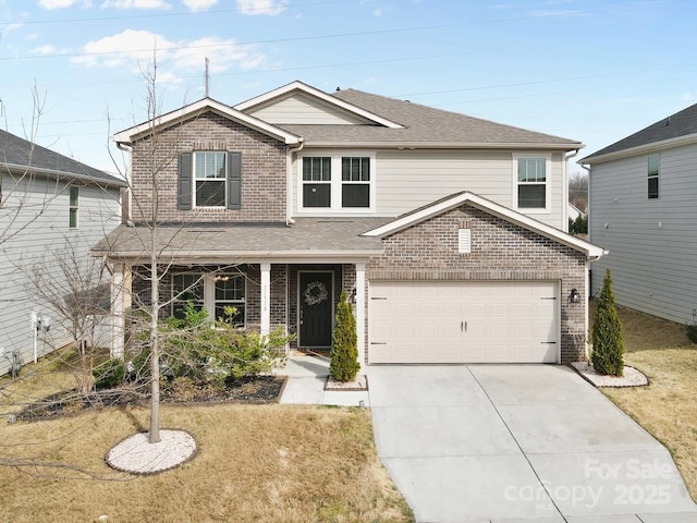 traditional home with brick siding, concrete driveway, and a shingled roof